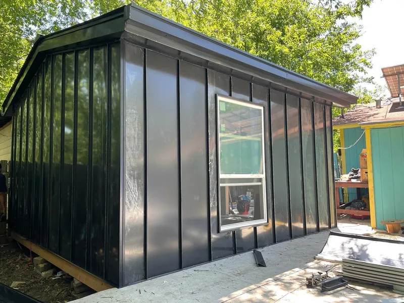 Black standing seam metal wall panels for Metal Roof Installation in Lynchburg