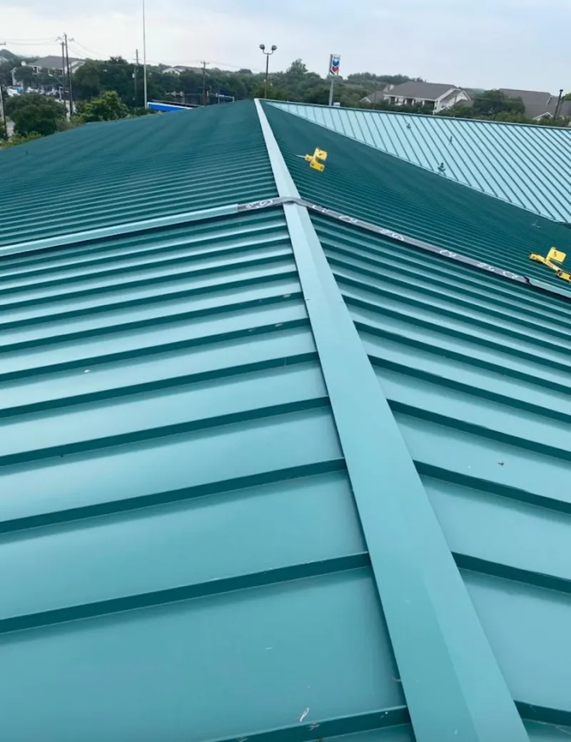 Green commercial metal roof ridge and valley for Metal Roof Repair in Lynchburg